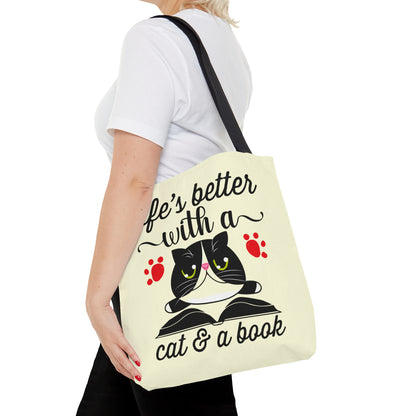 Cream Tote bag with a cat illustration and text 'life's better with a cat & a book'  