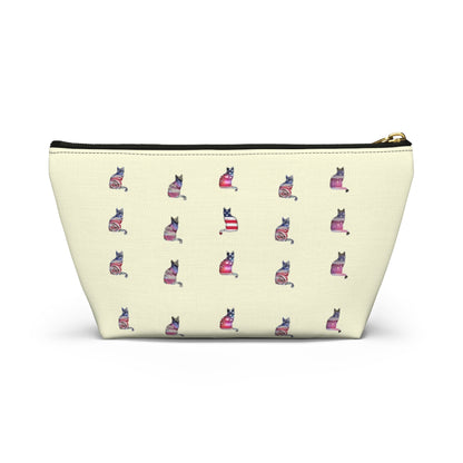 Cream color zipped accessory bag for organising makeup, cosmetics, travel essentials, toiltries, pencil case with 'LOVE' text and cat graphics in the colors of the American flag.