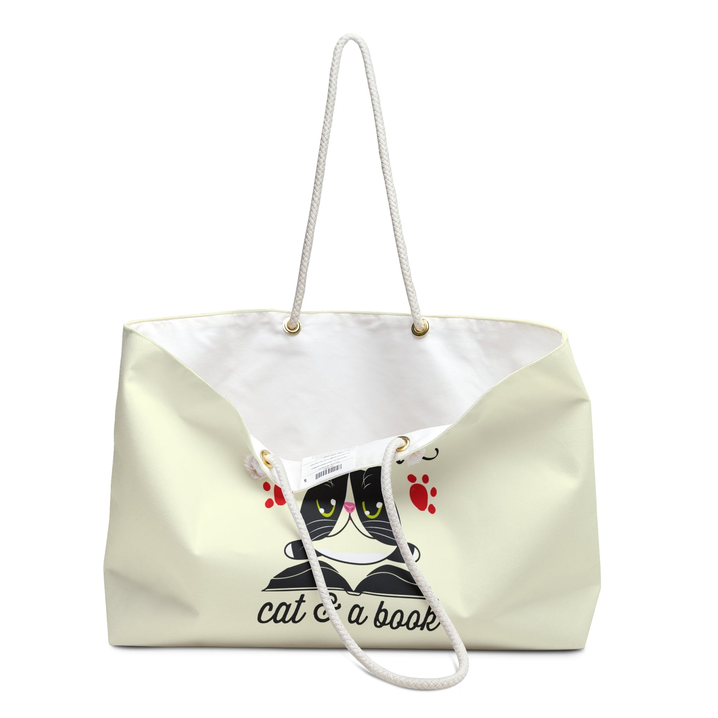 Cream colored Weekender Tote bag with a cat and book design and text 'life's better with a cat and a book'  
