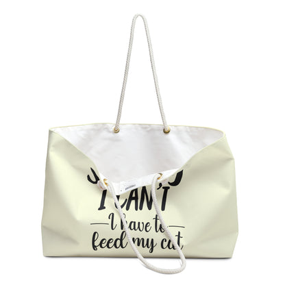 Cream colored tote bag with text 'Sorry I can't, I have to feed my cat'  