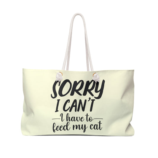 Cream colored tote bag with text 'Sorry I can't, I have to feed my cat'  