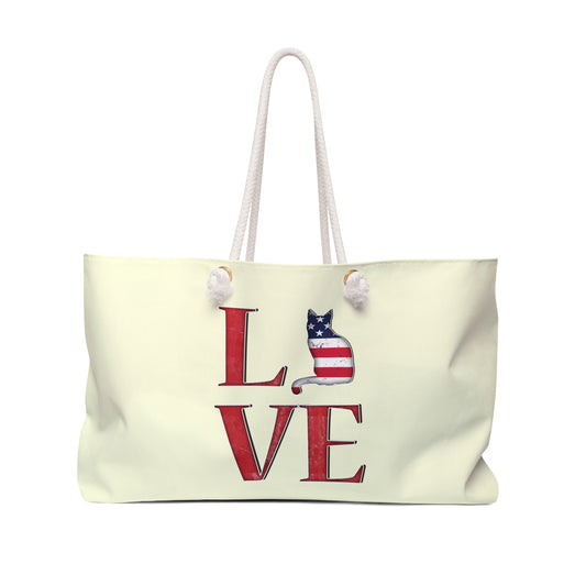 Cream colored weekender tote Bag with 'LOVE' text and cat silhouette design with a USA theme