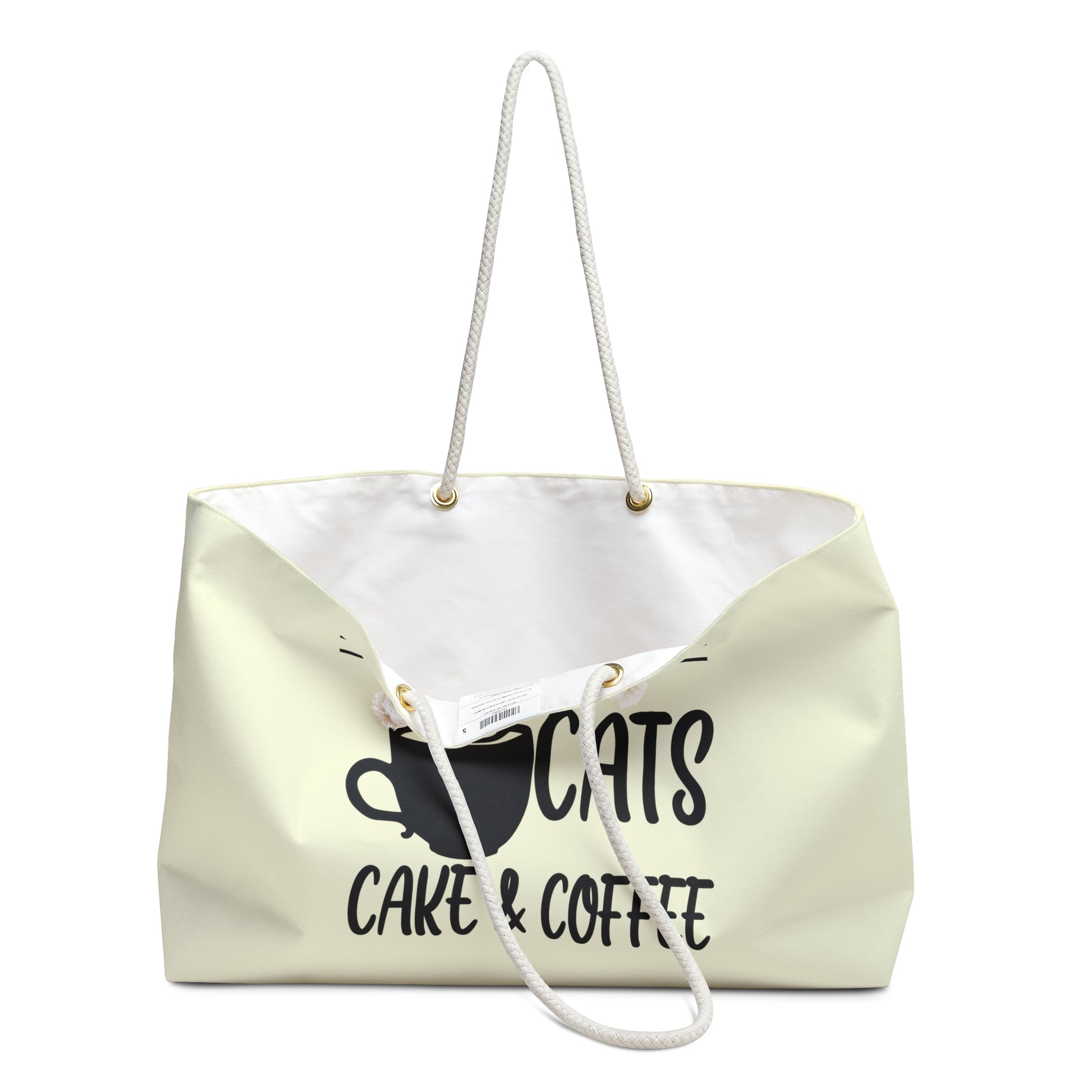 Cream colored weekender tote bag with the text 'I Want Cats, Cake & Coffee' and graphic of cat and coffee cup