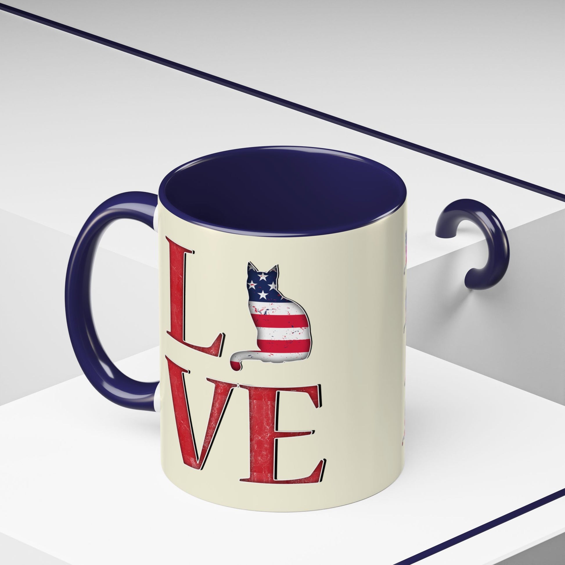 Navy mug with LOVE text and cat silhouette graphics in colors of American flag.