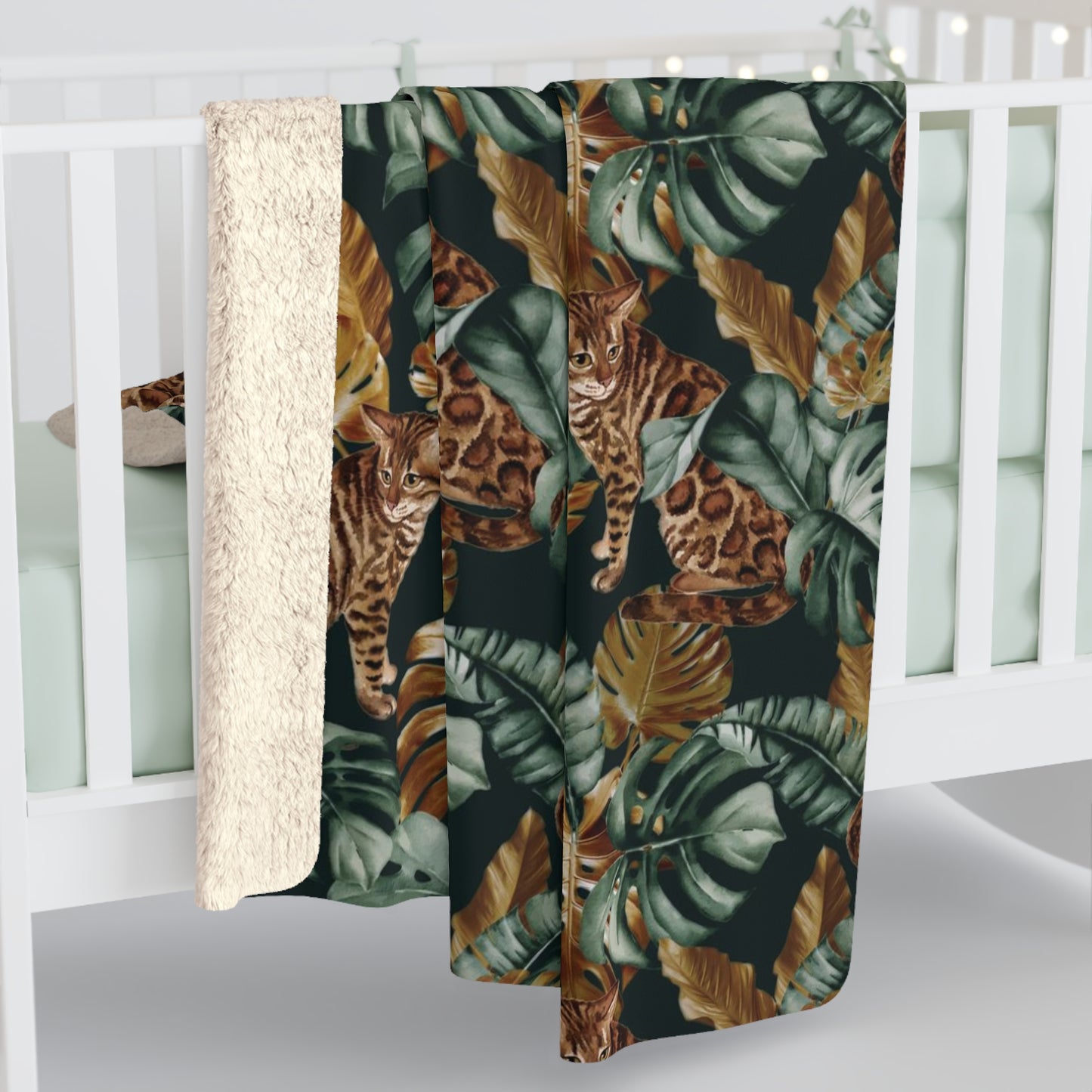 Fleece blanket with Bengal cats and oversized tropical leaves motif 