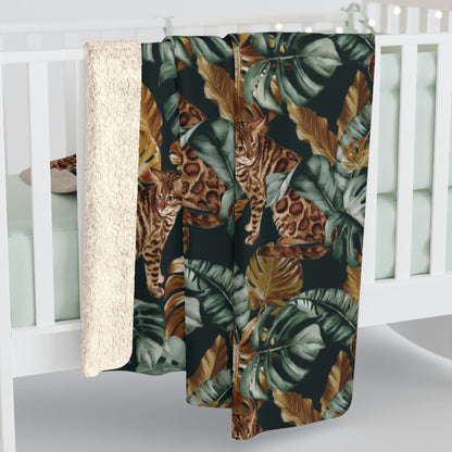 Fleece blanket with Bengal cats and oversized tropical leaves motif 