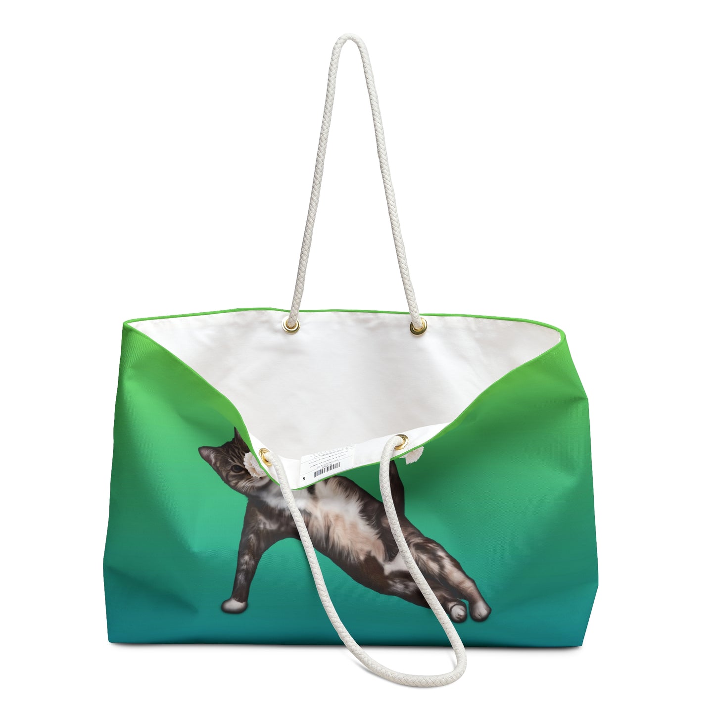 Green colored weekender tote bag with an illustration of a cat in a yoga pose
