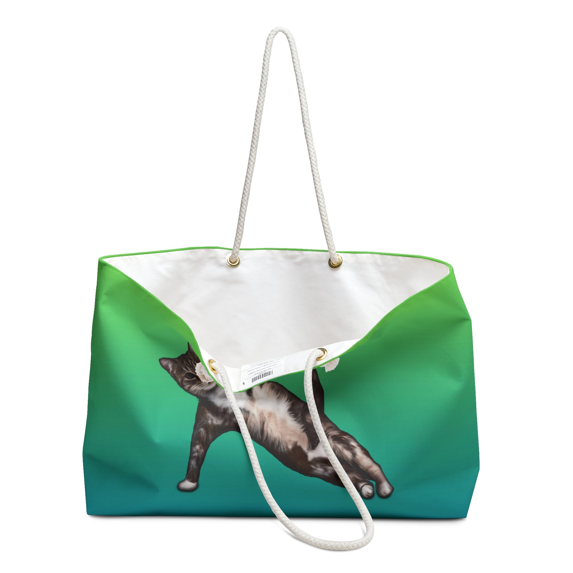 Green colored weekender tote bag with an illustration of a cat in a yoga pose