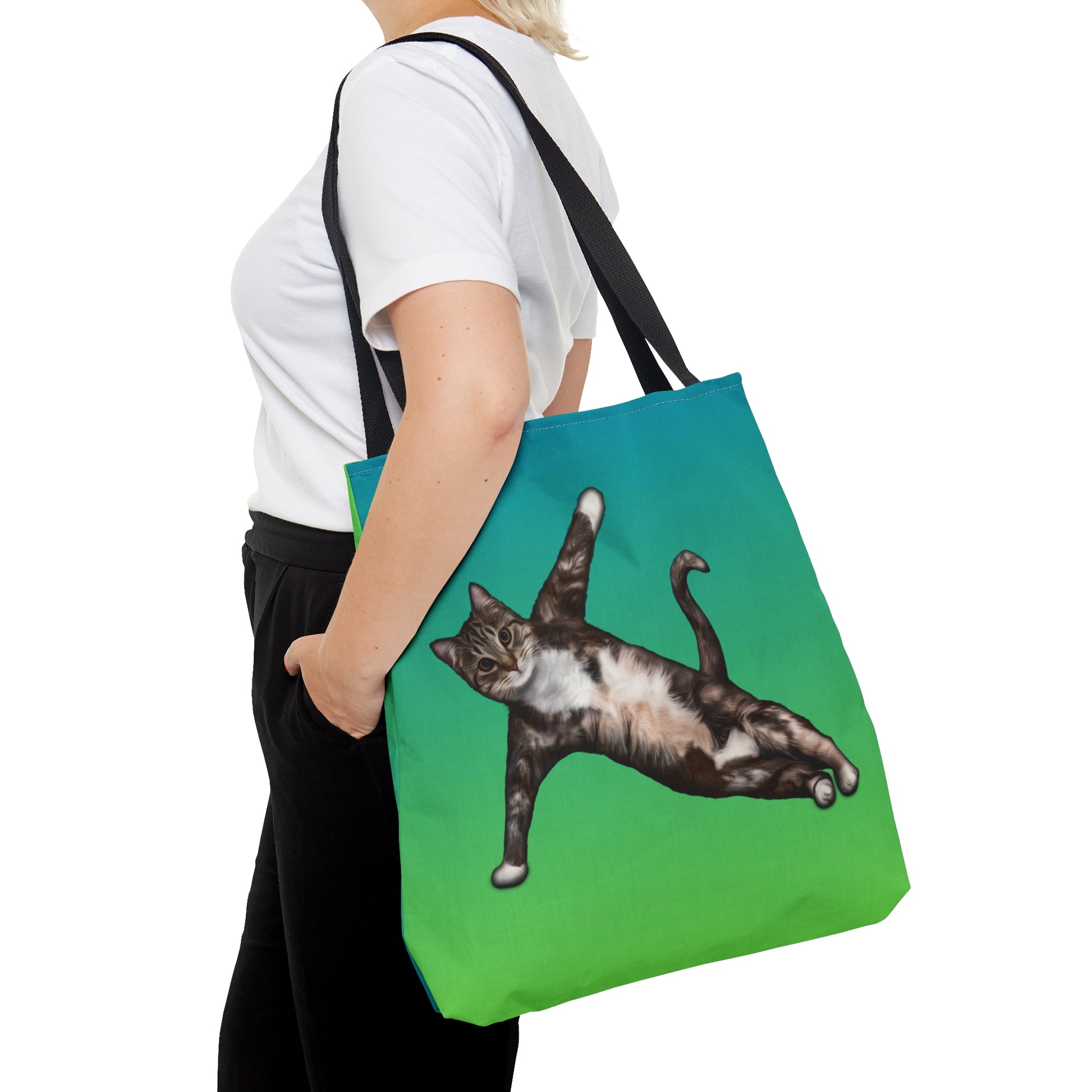 Tote bag with a cat in a yogi pose on a green gradient background
