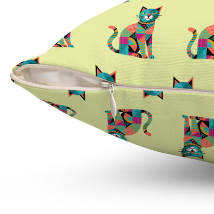 Indoor throw pillow with a repeating geometric pattern of colorful cats in blue, pink, green, and orange.