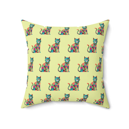 Indoor throw pillow with a repeating geometric pattern of colorful cats in blue, pink, green, and orange.