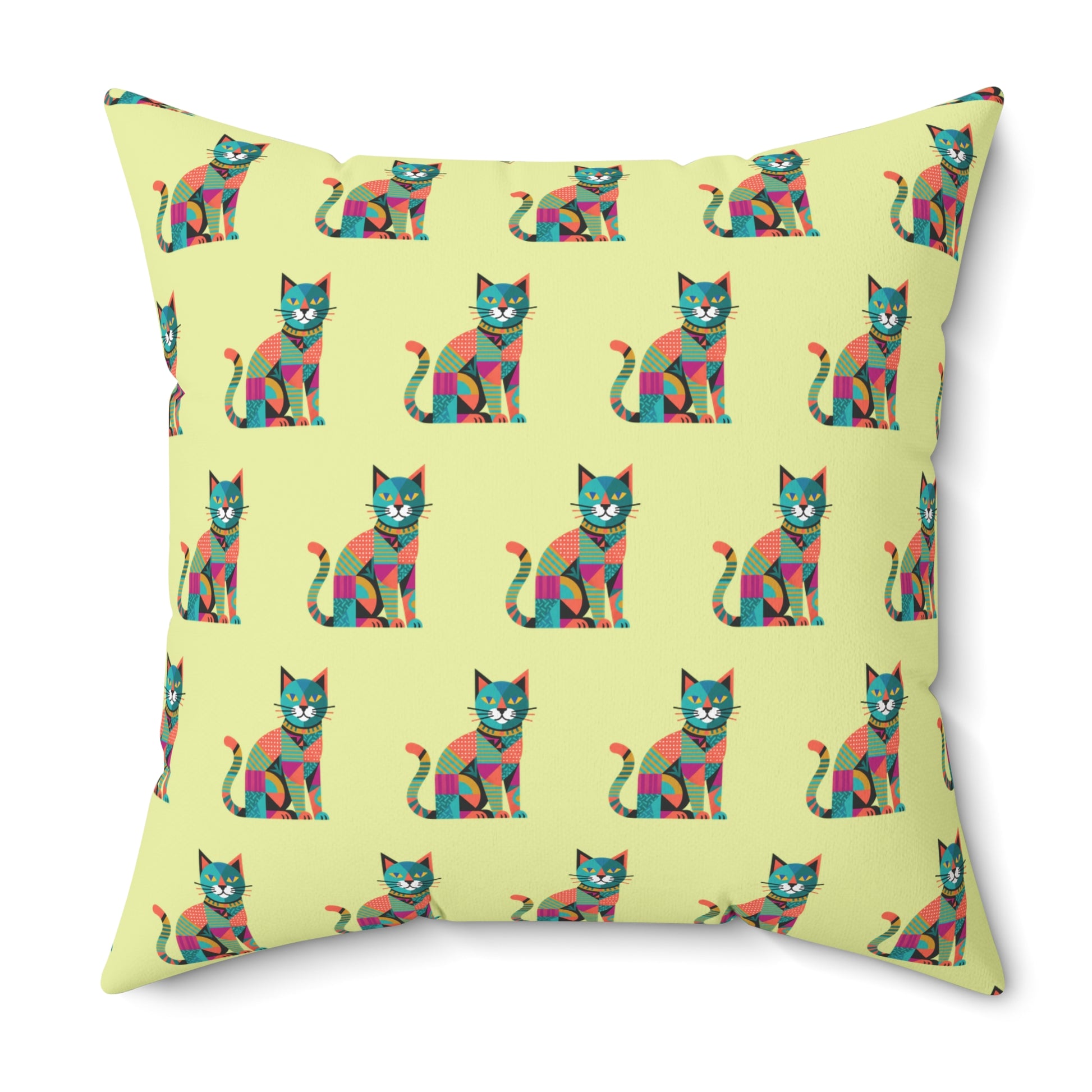 Indoor throw pillow with a repeating geometric pattern of colorful cats in blue, pink, green, and orange.
