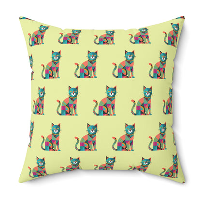 Indoor throw pillow with a repeating geometric pattern of colorful cats in blue, pink, green, and orange.