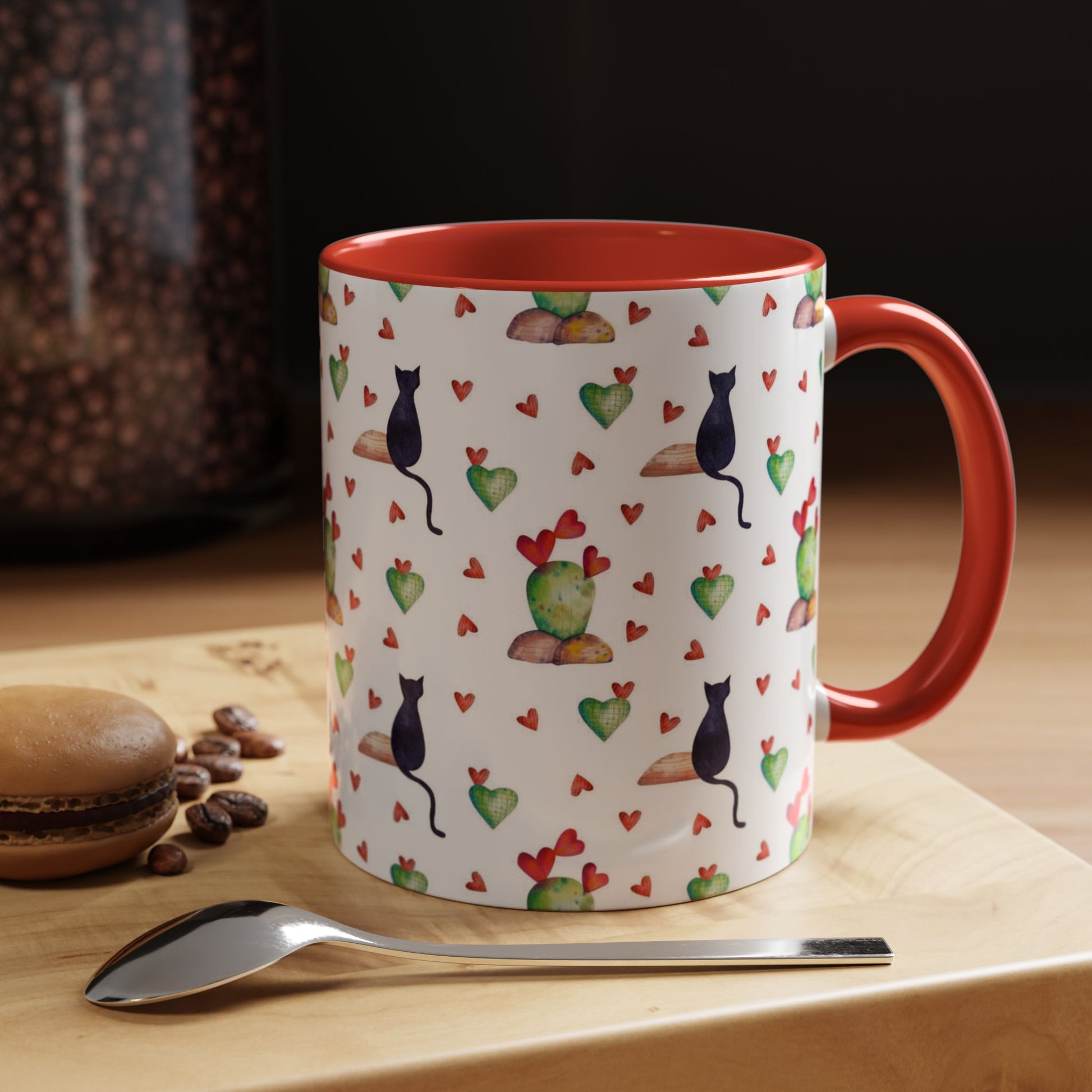 Mug featuring cat, heart and cactus pattern.