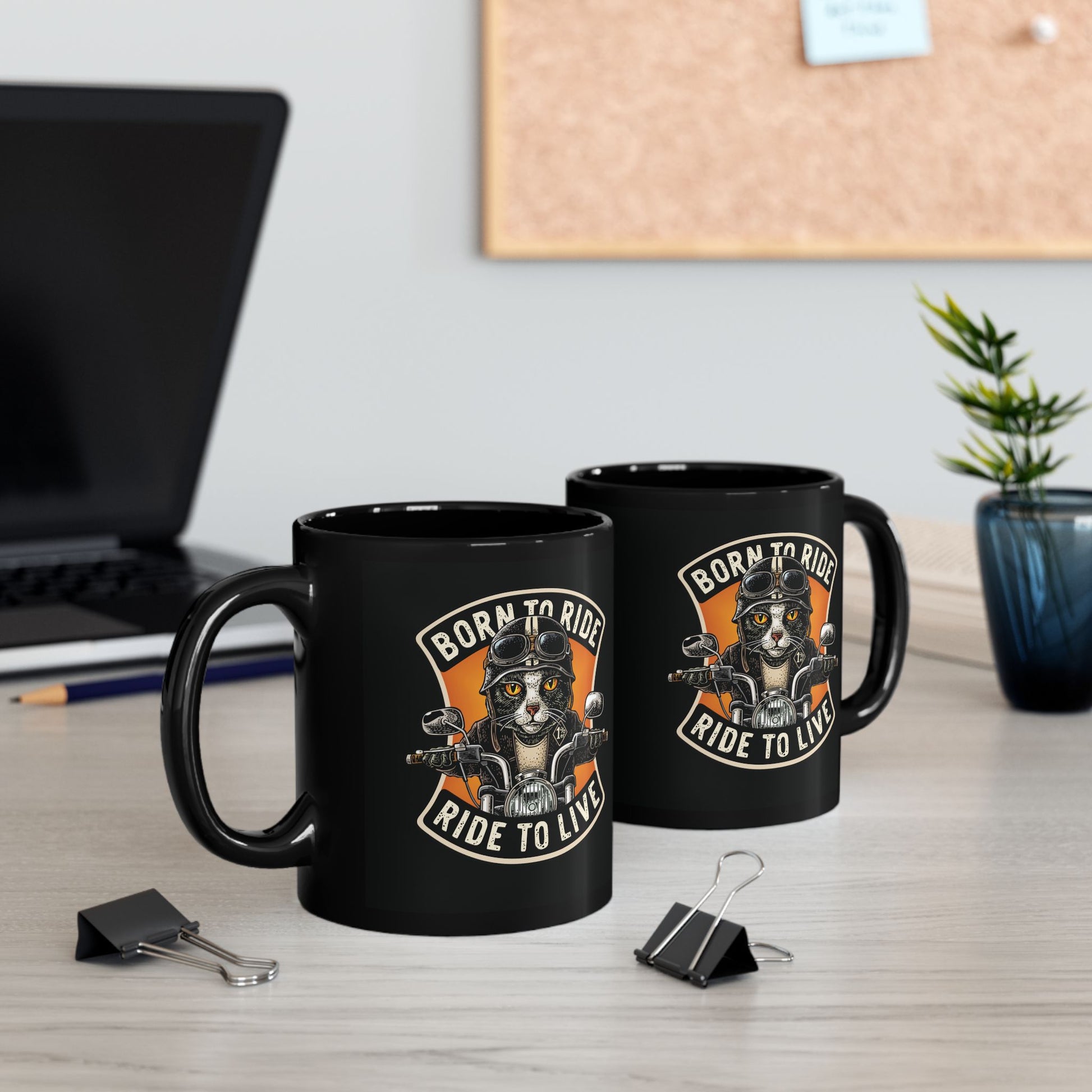 Black mug with a cat on a motorcycle graphic and 'Born to Ride, Ride to Live' text  