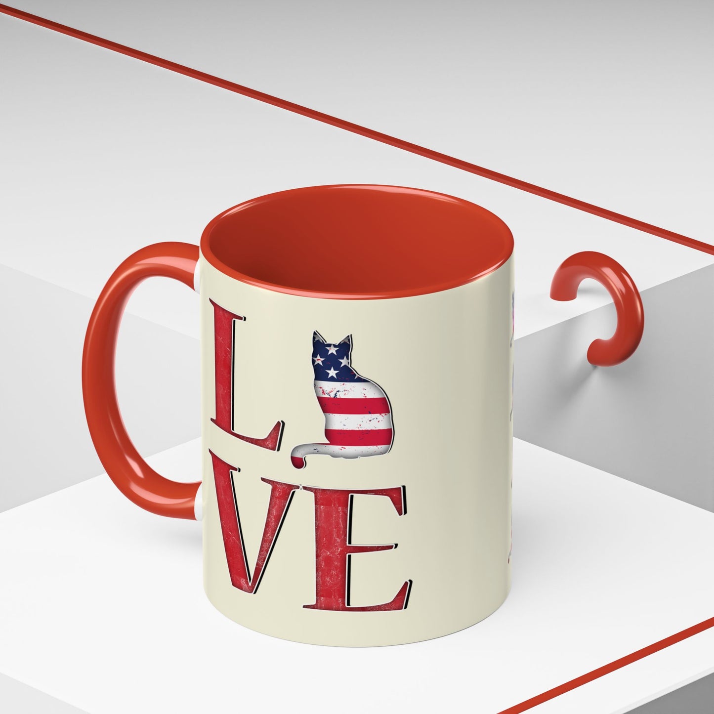 Red mug with LOVE text and cat silhouette graphics in colors of American flag.