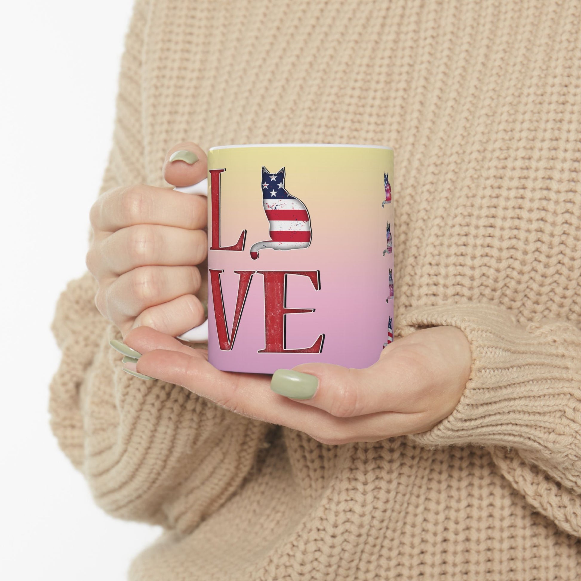Mug with 'LOVE' text and graphics of cat silhouettes in the Stars and Stripes.