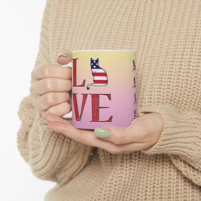 Mug with 'LOVE' text and graphics of cat silhouettes in the Stars and Stripes.