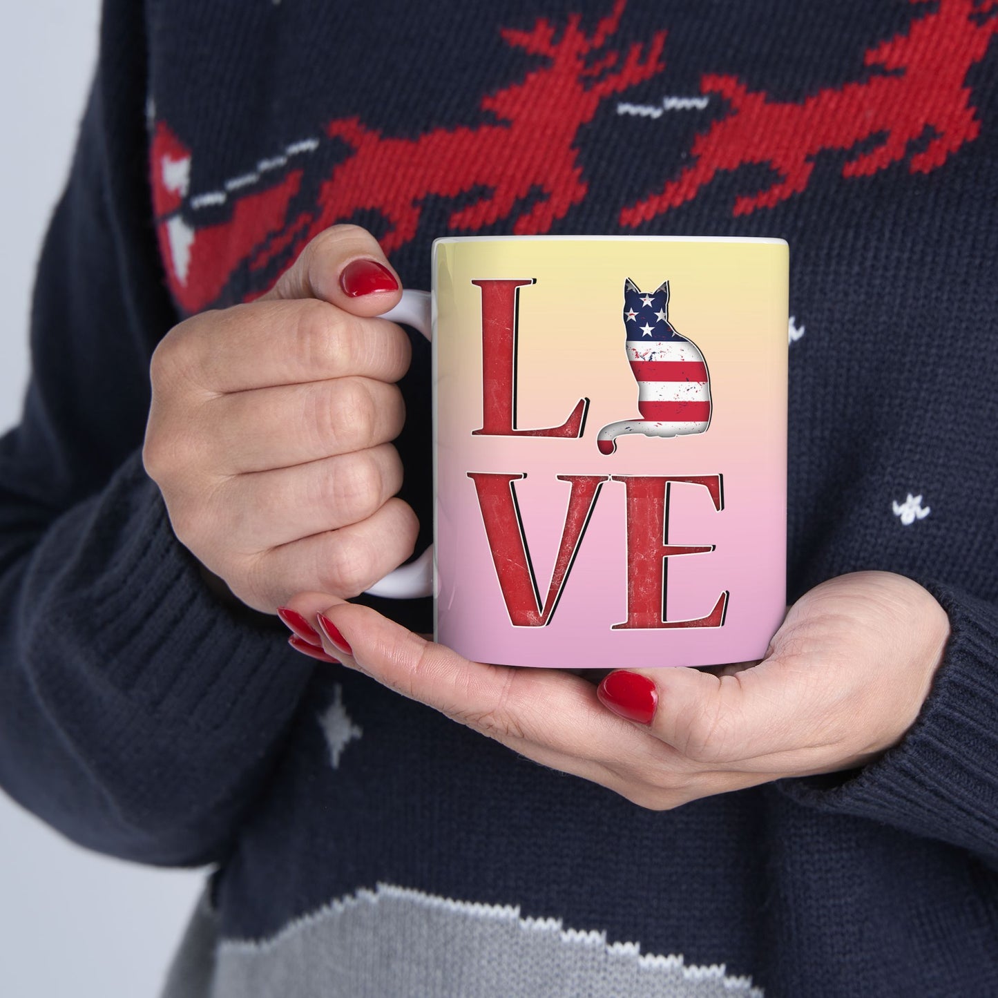 Mug with 'LOVE' text and graphics of cat silhouettes in the Stars and Stripes.