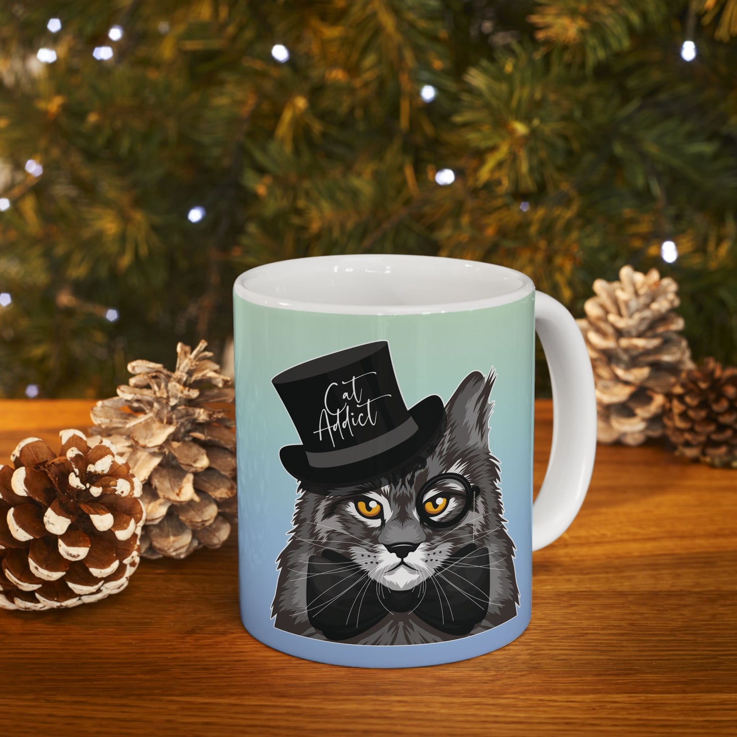 Mug with a Maine Coon cat illustration and the text 'Cat Addict.'