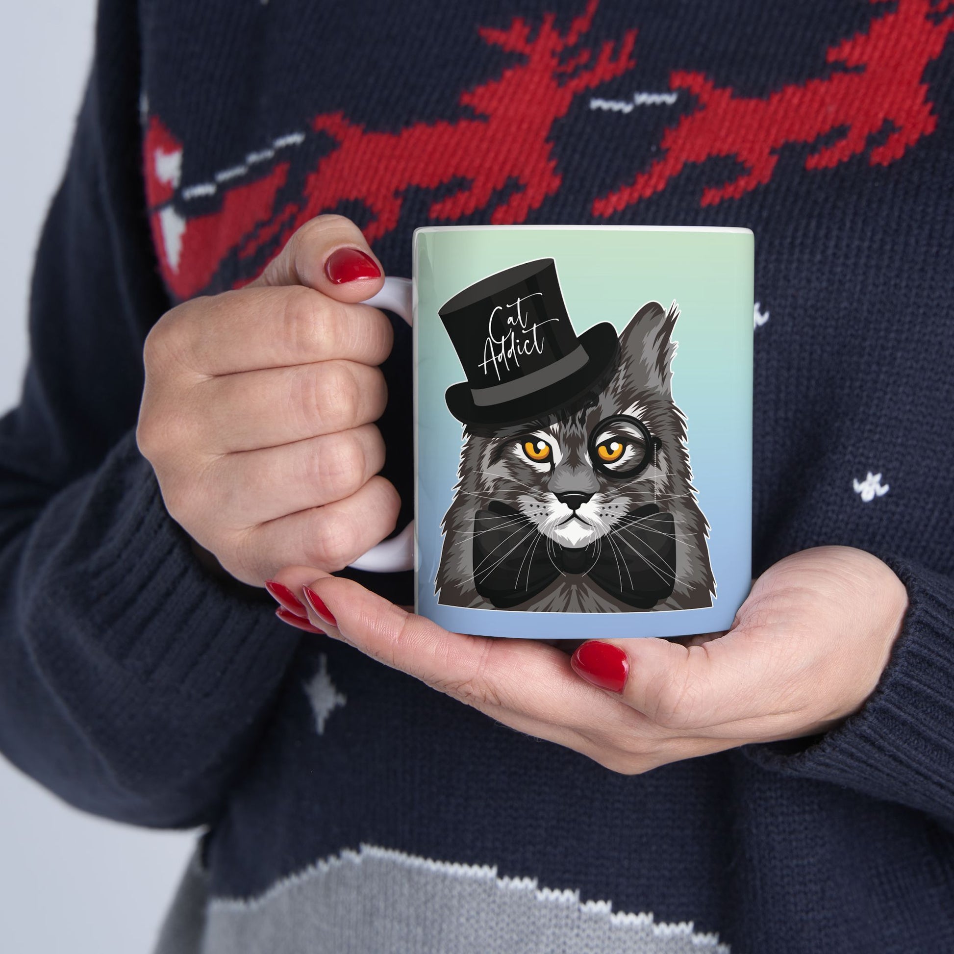 Mug with a Maine Coon cat illustration and the text 'Cat Addict.'