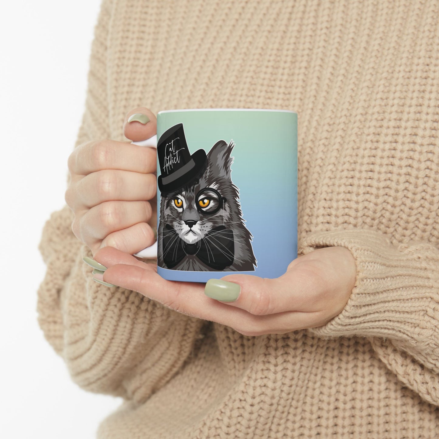 Mug with a Maine Coon cat illustration and the text 'Cat Addict.'