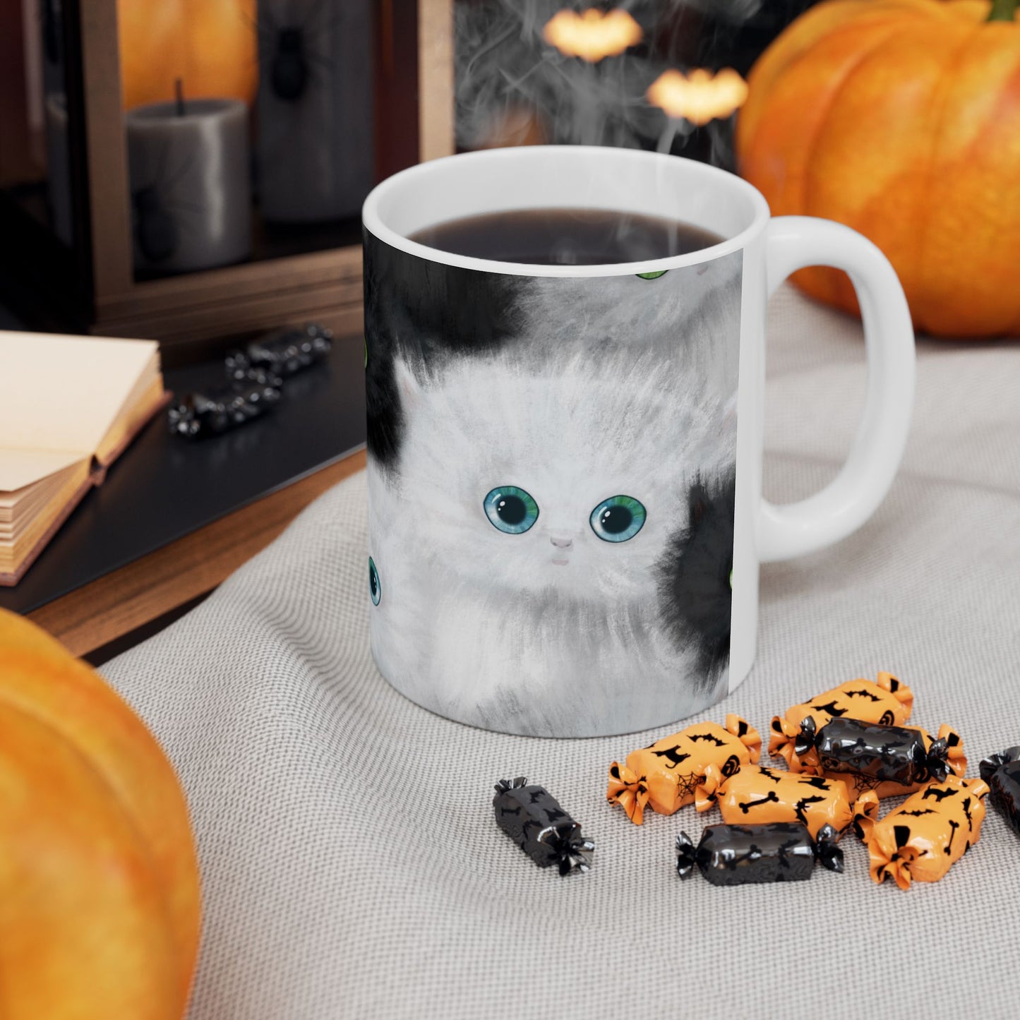 Mug with a design of black and white kittens.