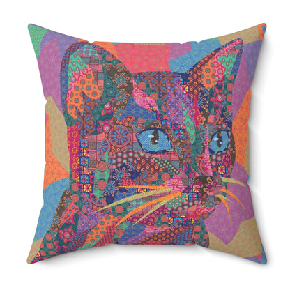Multi colored throw pillow with a geometric cat design 