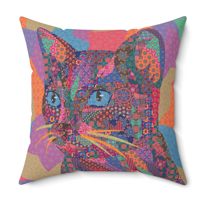 Multi colored throw pillow with a geometric cat design 