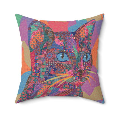 Multi colored throw pillow with a geometric cat design 
