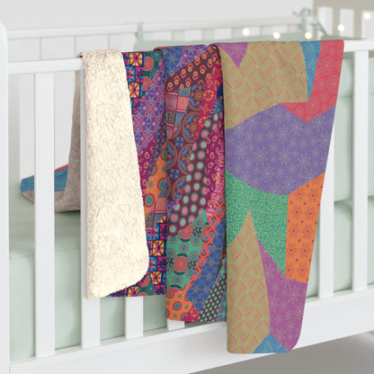 Multicolor fleece indoor throw blanket with a geometric graphic of a cat.