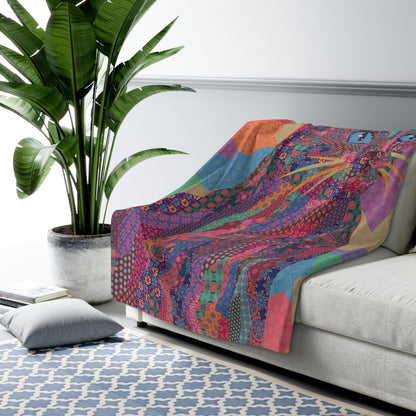 Multicolor fleece indoor throw blanket with a geometric graphic of a cat.