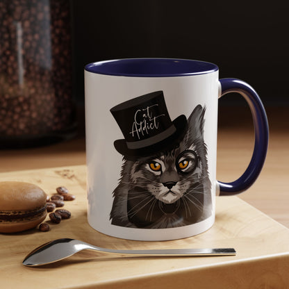 Mug with an illustration of a Maine Coon cat wearing a top hat and the text 'Cat Addict' 