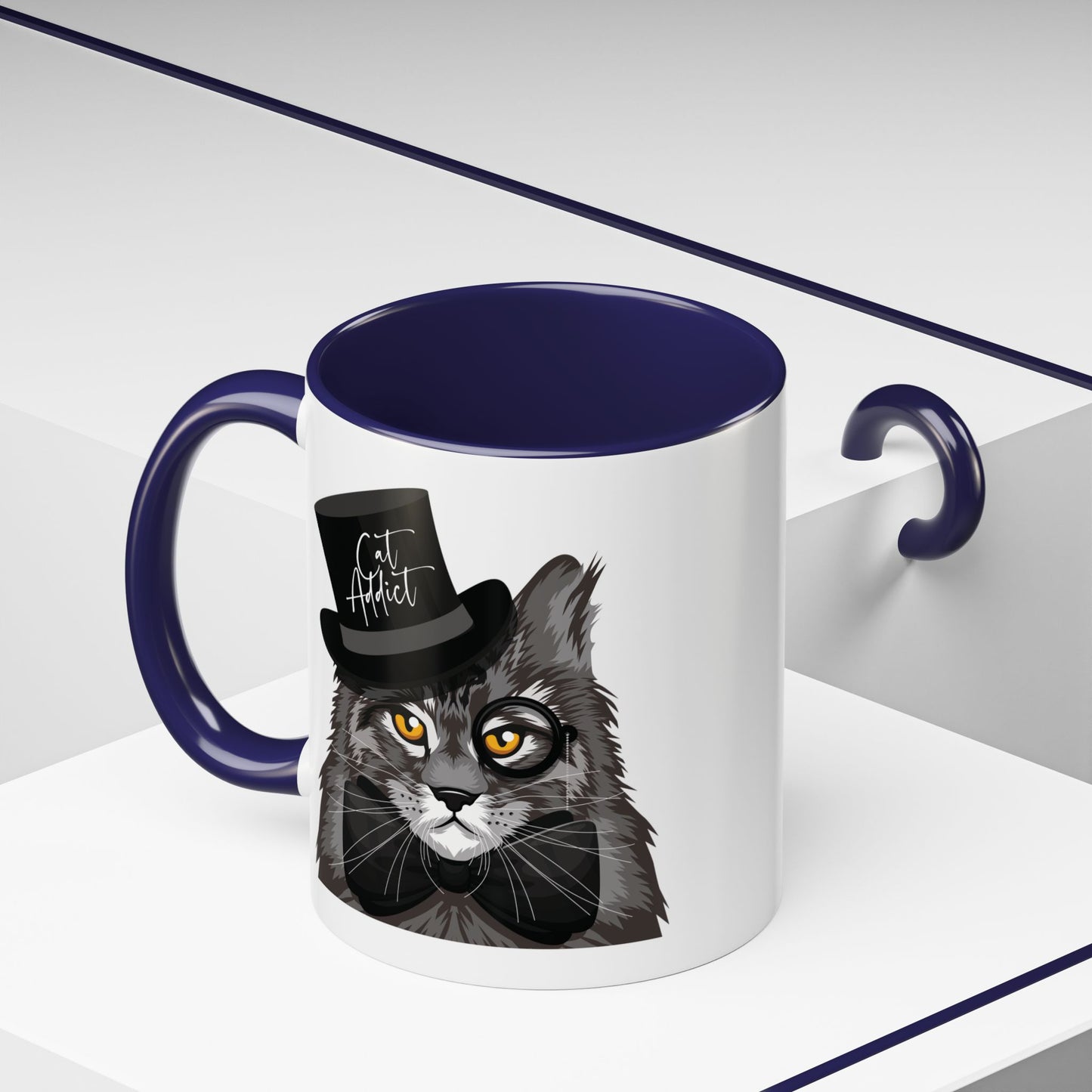 Mug with an illustration of a Maine Coon cat wearing a top hat and the text 'Cat Addict' 