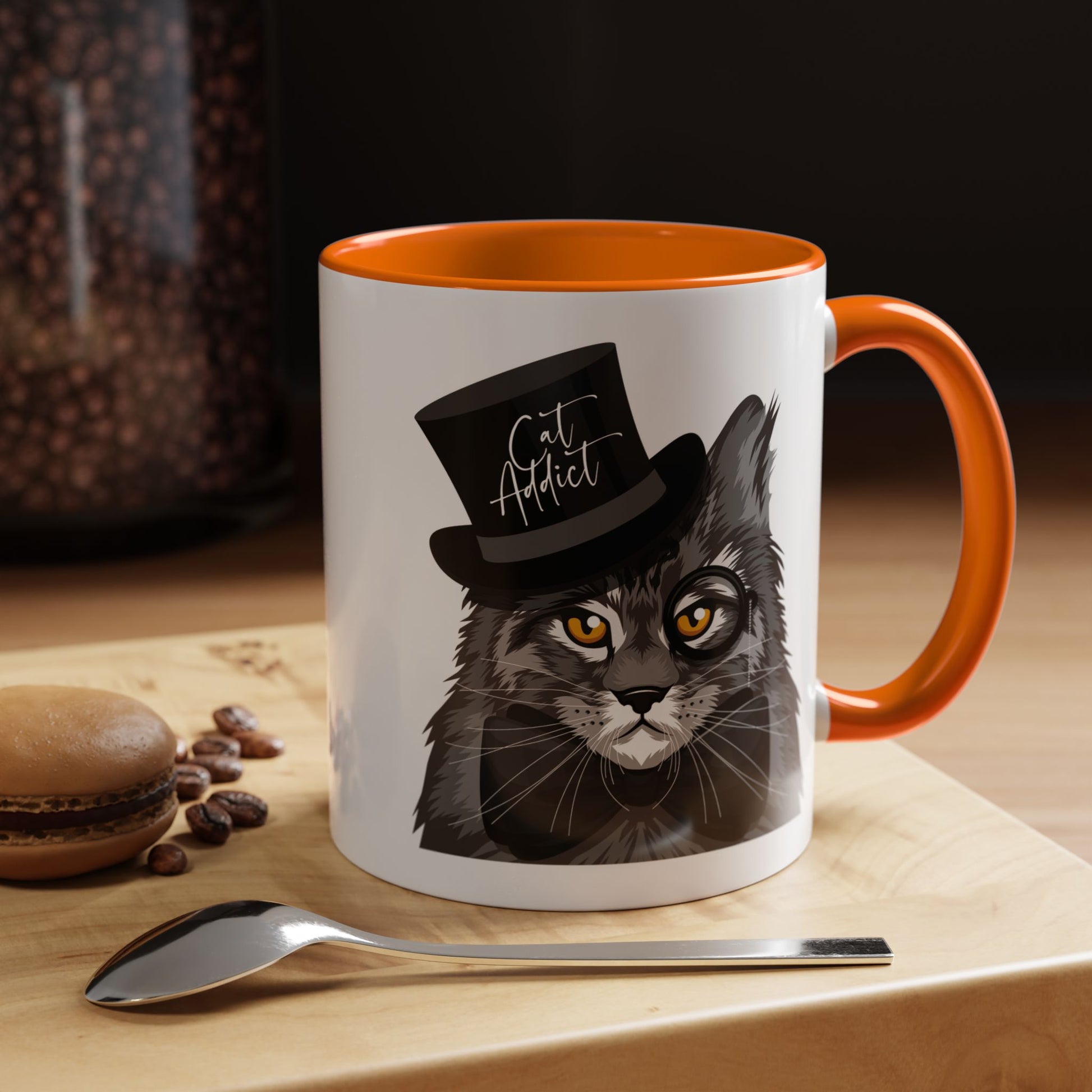 Mug with an illustration of a Maine Coon cat wearing a top hat and the text 'Cat Addict' 