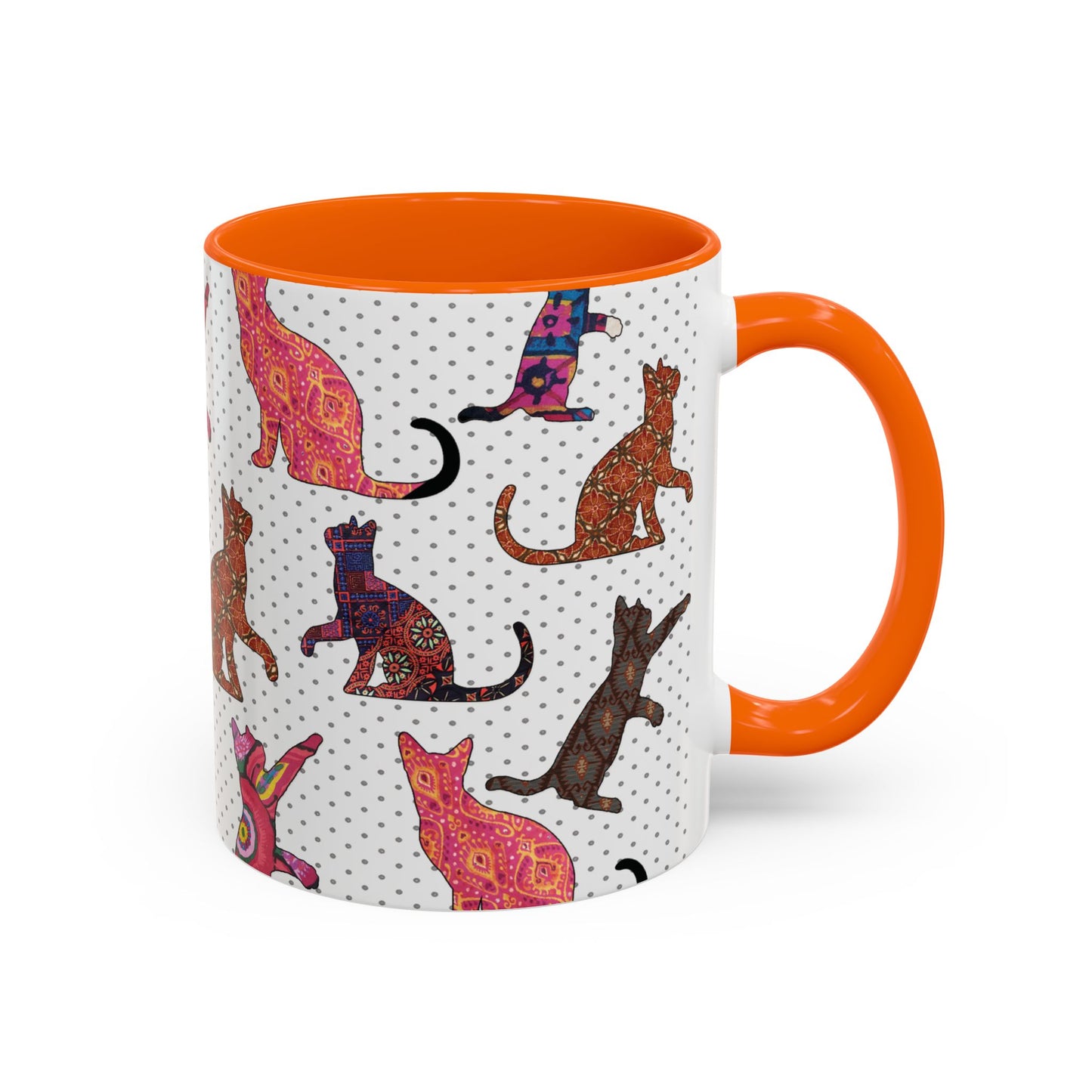 Orange mug with colorful cat silhouette pattern.