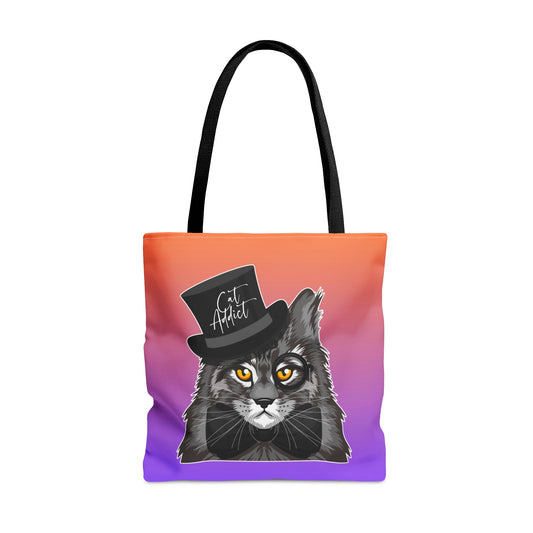 Orange & purple color Tote bag with an illustration of a Maine Coon cat wearing a top hat and the text 'Cat Addict.'   