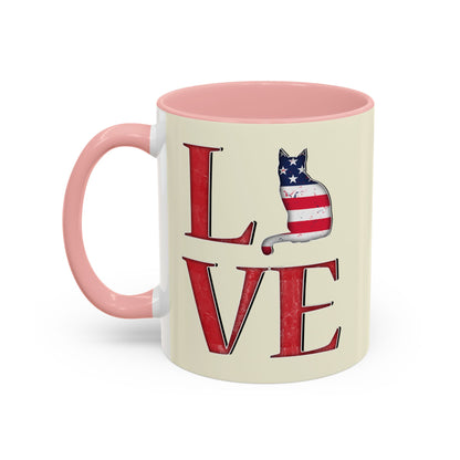 Pink mug with LOVE text and cat silhouette graphics in colors of American flag.
