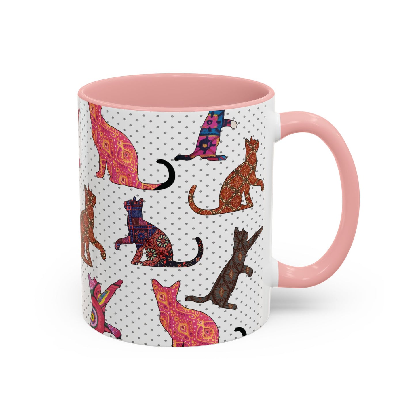 Pink mug with colorful cat silhouette pattern.