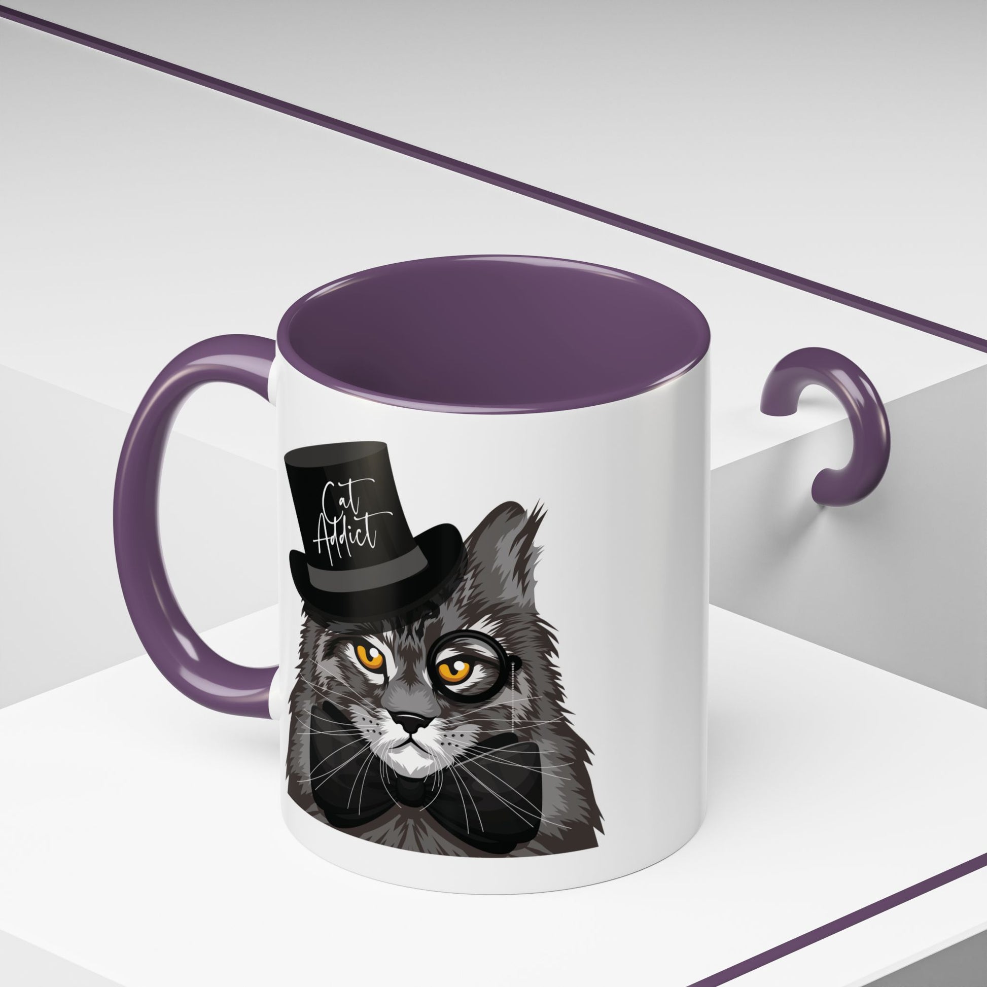 Mug with an illustration of a Maine Coon cat wearing a top hat and the text 'Cat Addict' 