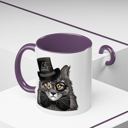 Mug with an illustration of a Maine Coon cat wearing a top hat and the text 'Cat Addict' 