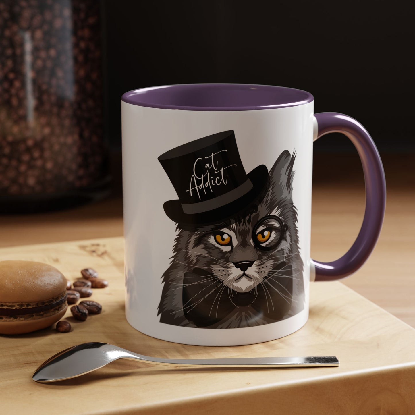 Mug with an illustration of a Maine Coon cat wearing a top hat and the text 'Cat Addict' 
