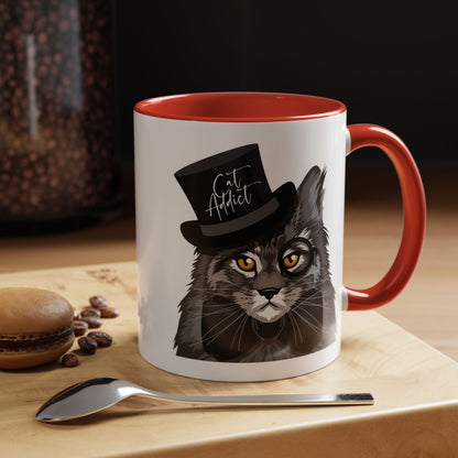 Mug with an illustration of a Maine Coon cat wearing a top hat and the text 'Cat Addict' 