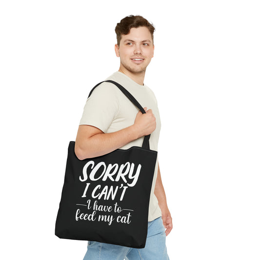 "Sorry I can't i have to feed my cat" black tote bag
