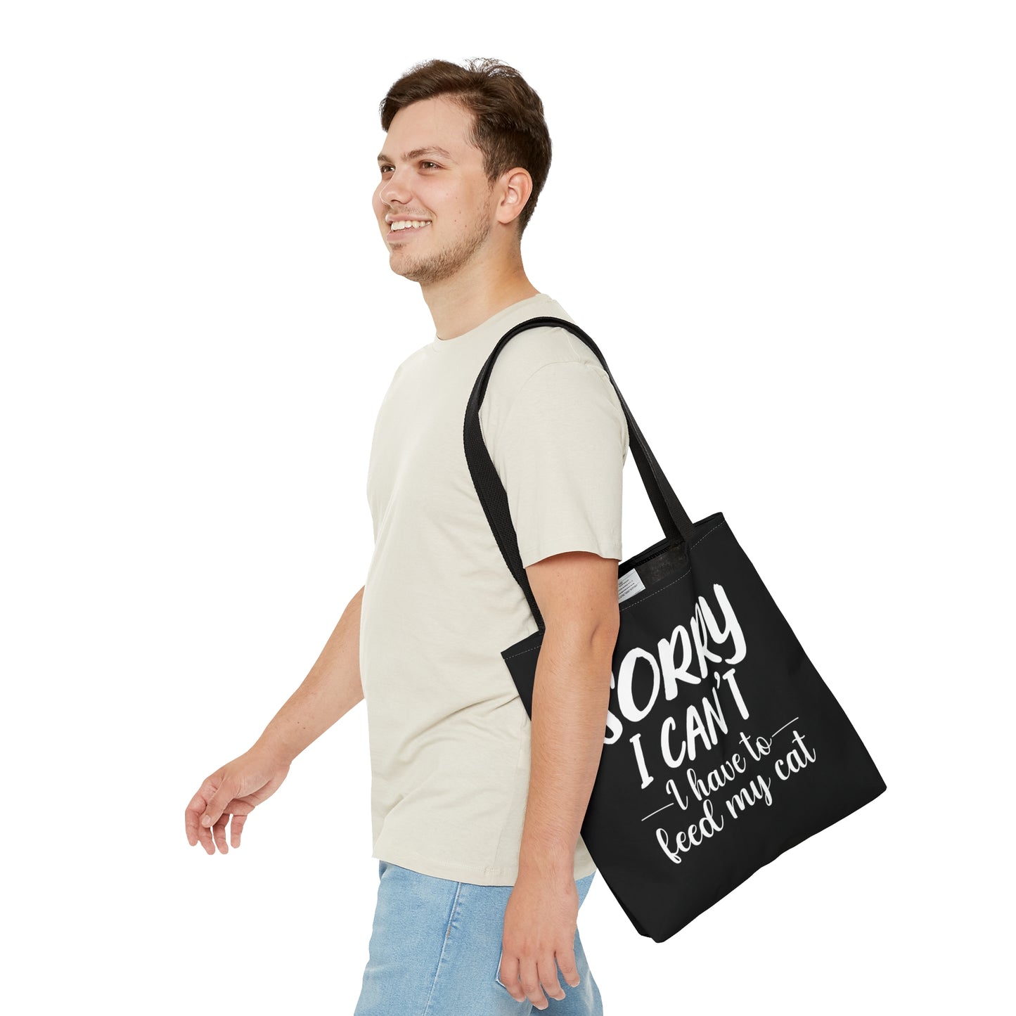 "Sorry I can't i have to feed my cat" black tote bag