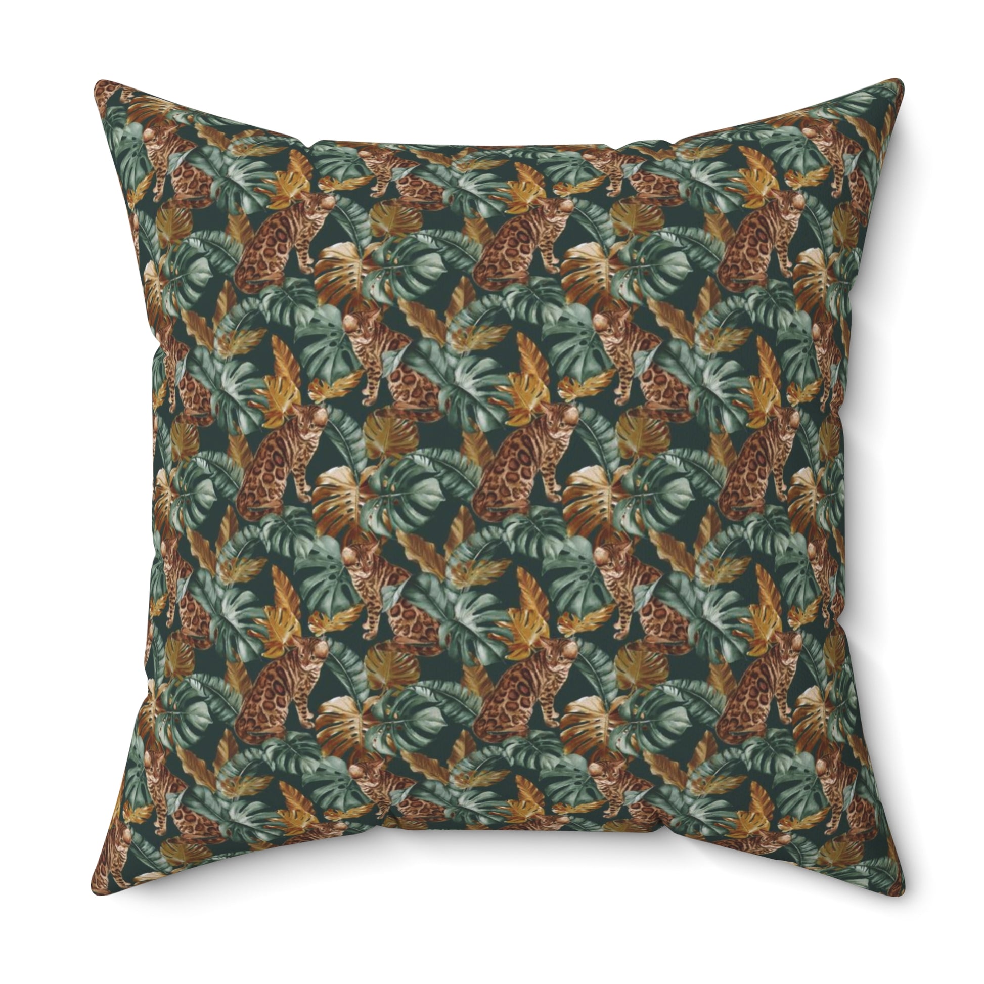 Square throw pillow with Bengal cat and oversized tropical leaf pattern 