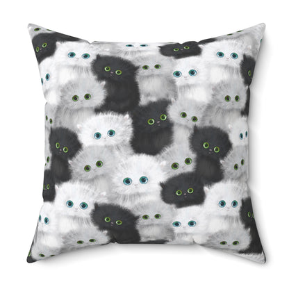 Square throw pillow with black and white fluffy kittens motif