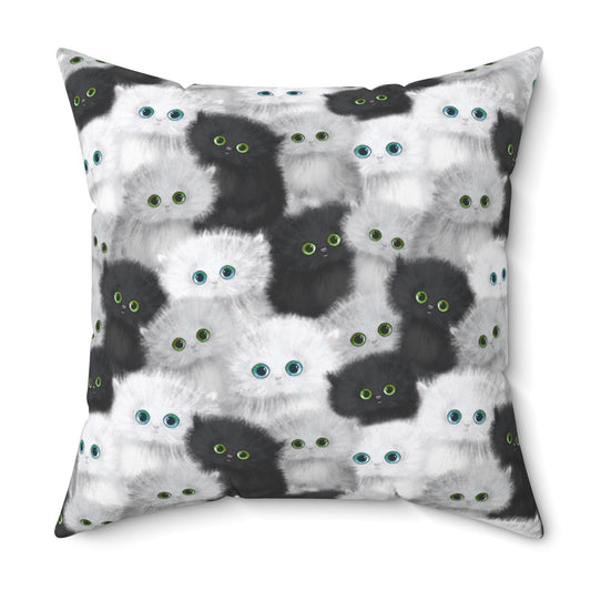 Square throw pillow with black and white fluffy kittens motif