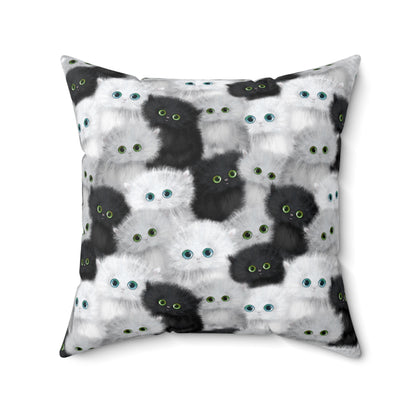 Square throw pillow with black and white fluffy kittens motif