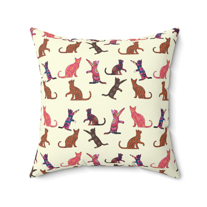 Square throw pillow with cat silhouette motif